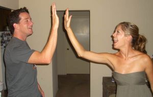 Image of couple doing high five